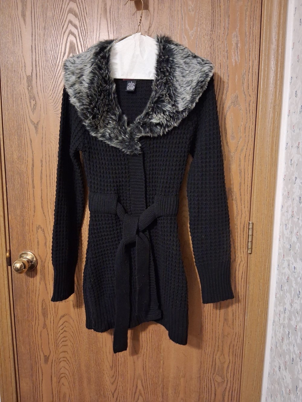 Say What? Black Knit Belted Cardigan with Gray Faux-Fur Collar